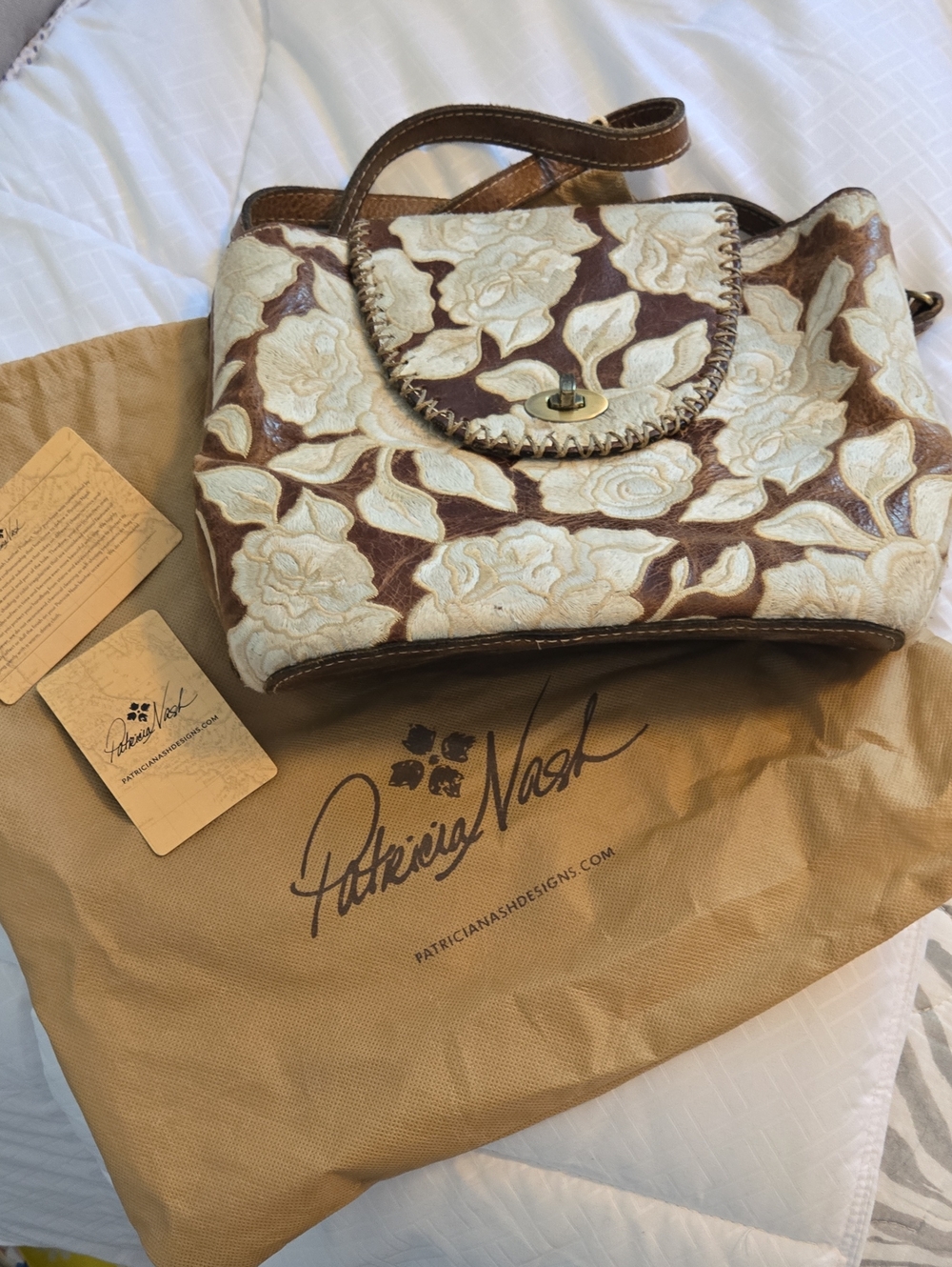 Patricia Nash Cream Floral Embroidered Leather Shoulder Bag with Brown Trim.